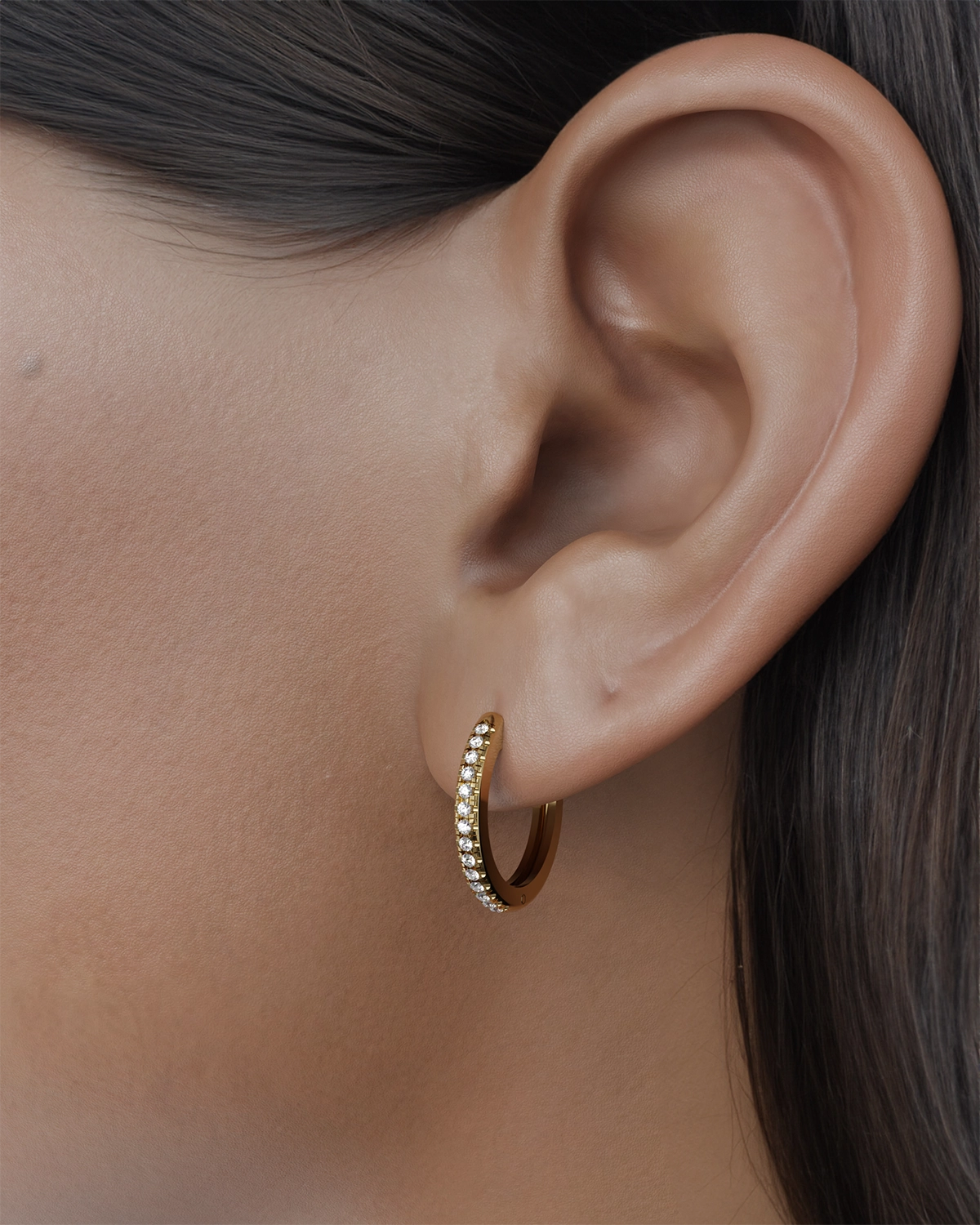 An elegant piece designed to reflect the soft whispers of your deepest thoughts. Produced with love and care, these earrings symbolize inner peace and self-discovery. Each earring is adorned with sparkling gemstones that catch the light, reflecting the beauty of your soul.