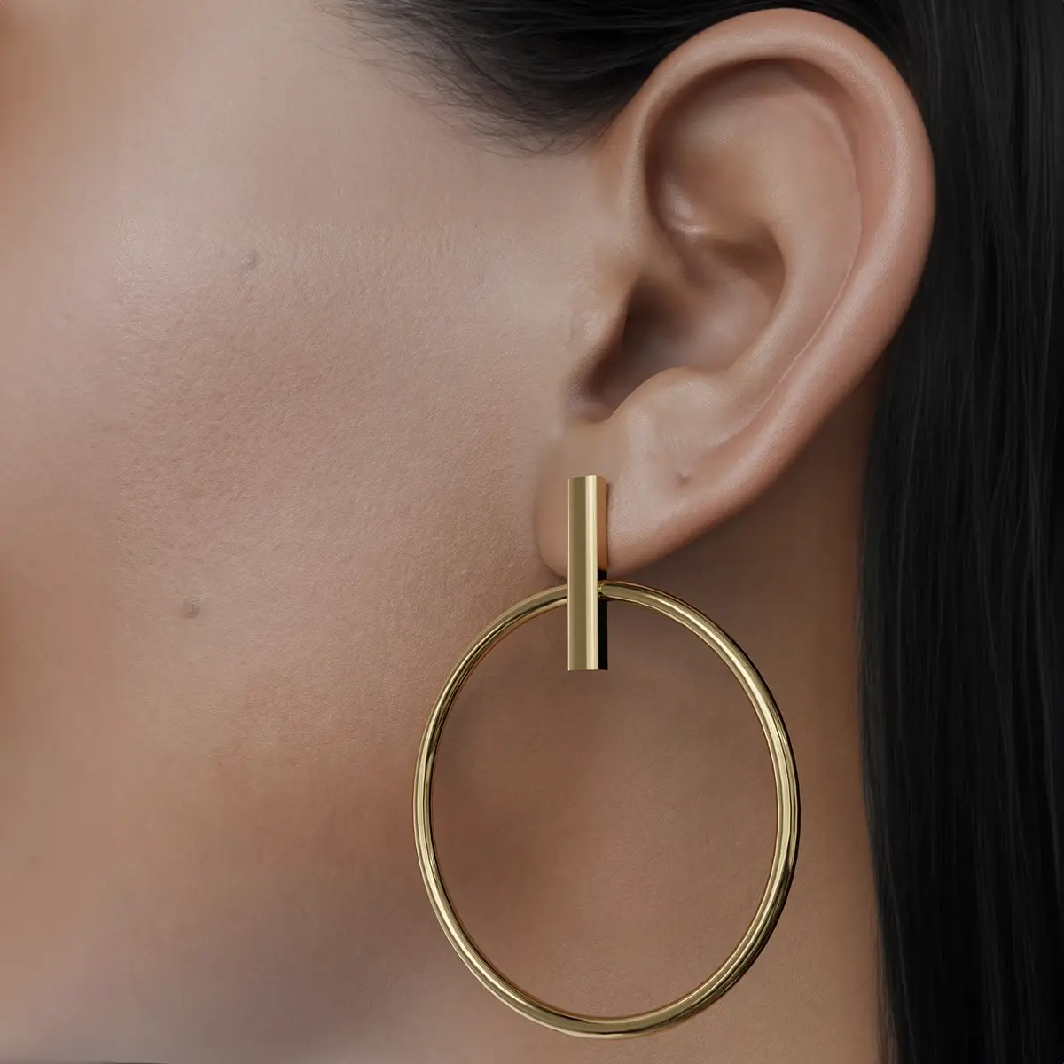 This unique earring features a beautifully crafted round piece delicately suspended from a slender stick, creating an eye-catching and contemporary aesthetic. The interplay between the sleek stick and the circular charm adds a modern twist to classic elegance, making it a versatile accessory for any outfit. Whether dressed up for a night out or paired with casual attire, this earring effortlessly elevates your style, showcasing a harmonious blend of sophistication and creativity.