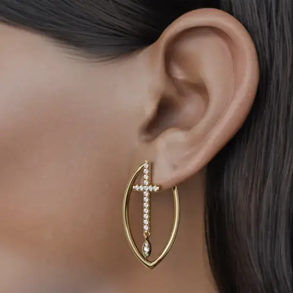 Meet our luxurious earrings featuring a striking diamond cross motif, elegantly surrounded by a stunning gold marquise design. This elegant piece seamlessly blends timeless elegance with modern sophistication, making it an essential part of every jewelery collection. Shimmering gold marquise lines capture and reflect light with every movement, beautifully highlighting the center diamond. Embrace the elegance and versatility of this stunning piece, a true testament to refined craftsmanship and design.