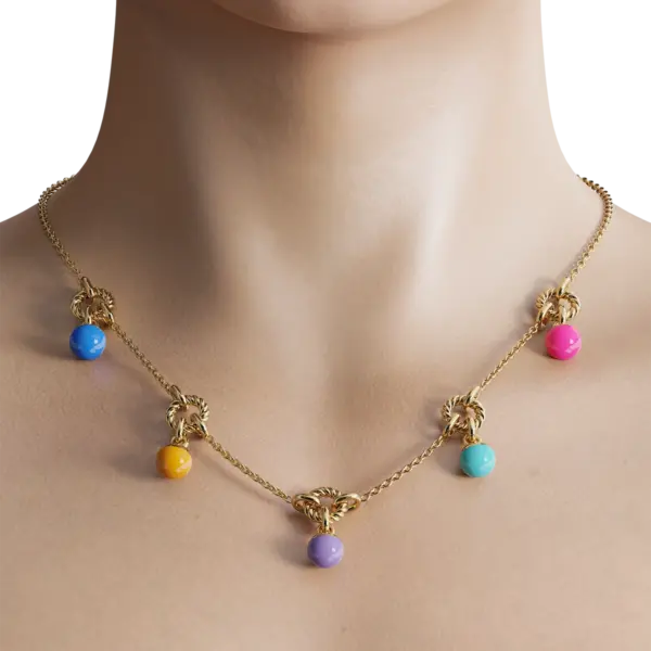 Make a bold statement with this colorful gold ball necklace! This playful piece features a cluster of colorful balls in a mix of bright, bold colors, including red, orange, yellow, green, blue, and purple. The balls are made from high-quality gold-plated metal and are suspended from a delicate chain, creating a fun and playful effect. Whether you're dressing up or dressing down, this necklace is the perfect way to add a touch of fun and whimsy to your look.