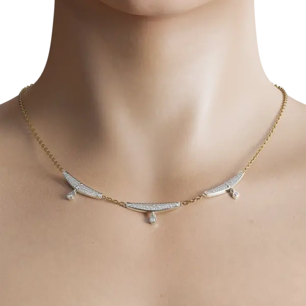This delicate necklace features shimmering, ethically sourced diamonds set in a lustrous, high-quality metal that gleams with every movement. Its dainty design makes it perfect for layering with other necklaces or wearing solo for a more understated look.