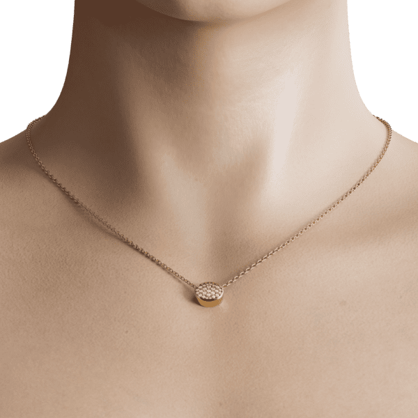 Get ready to fall in love with our dainty oval shape necklace. This elegant design features a delicate oval pendant that's the perfect size for everyday wear. The subtle curve of the pendant creates a beautiful silhouette against the skin, making it easy to pair with everything from casual tees to dressy tops. A classic choice for any jewelry lover.