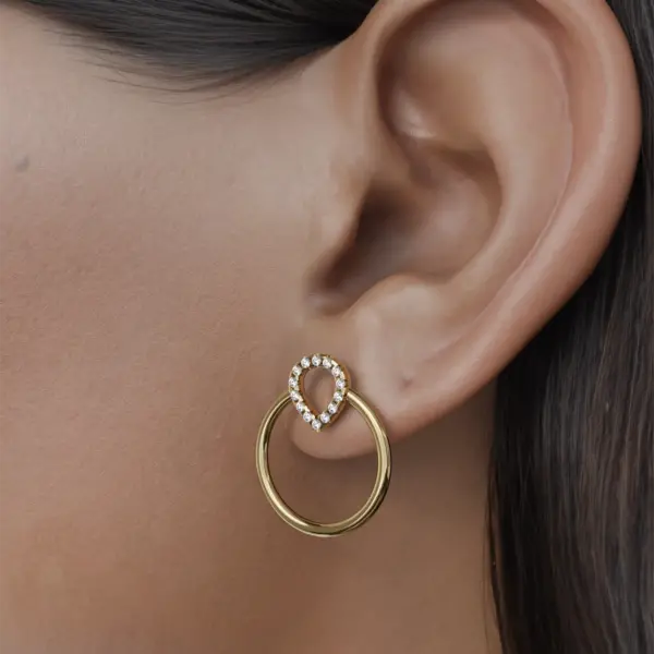 Introducing our "Tears of Joy" earrings, a captivating embodiment of celestial beauty. With a stunning round design that mirrors the profound emotions of the universe, these earrings radiate elegance and grace. Their distinctive shape draws the eye, illuminating your style with a touch of cosmic charm. Crafted with meticulous attention to detail, each piece reflects the joyous essence of the stars, making them the perfect accessory for those who dare to shine. Let the "Tears of Joy" earrings be your reminder to embrace the beauty of every moment, celebrating the emotional journey we all share.