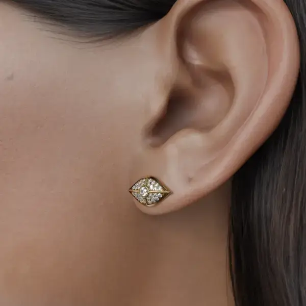 The unique design incorporates the traditional evil eye symbol, intricately woven into the setting, making these earrings a beautiful statement piece while offering spiritual protection. Each diamond reflects light brilliantly, creating a mesmerizing shimmer that draws attention and admiration, while its deeper meaning serves as a constant guardian against negativity.