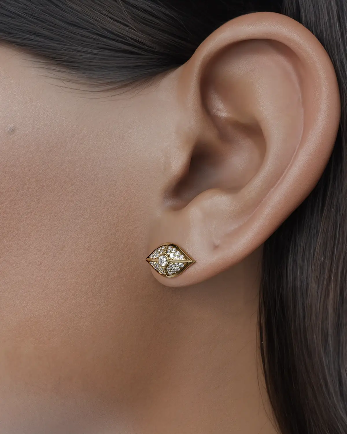 The unique design incorporates the traditional evil eye symbol, intricately woven into the setting, making these earrings a beautiful statement piece while offering spiritual protection. Each diamond reflects light brilliantly, creating a mesmerizing shimmer that draws attention and admiration, while its deeper meaning serves as a constant guardian against negativity.