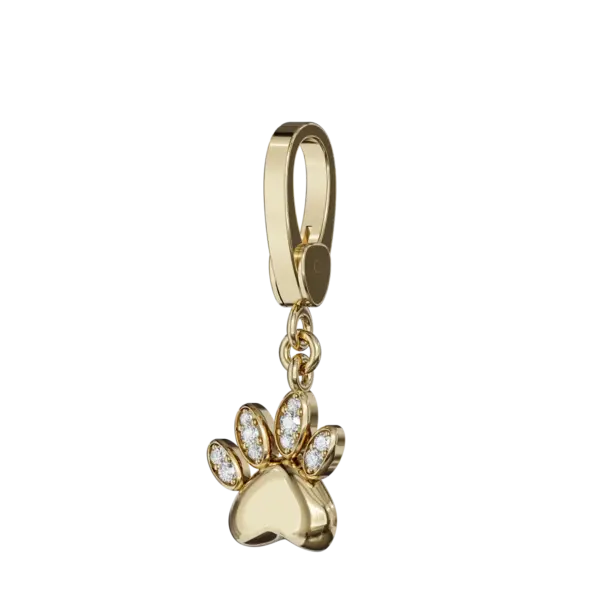 Up your accessory game with our stunning Gold Claw Charm studded with sparkling diamonds. This trendy charm captures the essence of elegance and love for your furry friends, making it a must-have item for animal lovers and trendsetters alike. Whether worn on a bracelet, necklace or keychain, this jewelry is a lovely reminder of the precious bond between you and your pets. Embrace the trend and show off your style with this elegant piece that adds a touch of glamor to any occasion.
